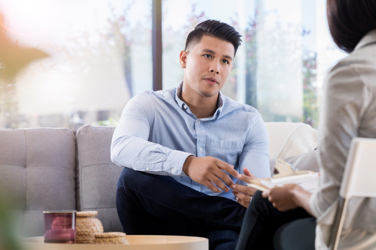 Client and therapist in a counselling room, representing sexual health conversations in therapy.